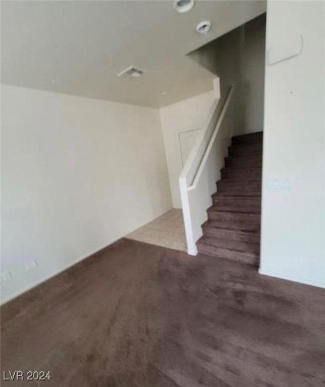 basement featuring hardwood / wood-style floors