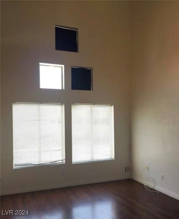 empty room featuring hardwood / wood-style flooring