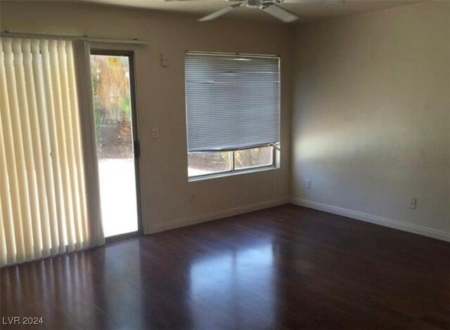 unfurnished room featuring ceiling fan, hardwood / wood-style flooring, and a wealth of natural light