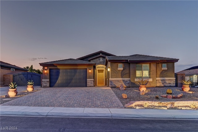 prairie-style home with a garage