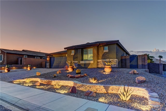 view of front of property featuring a garage