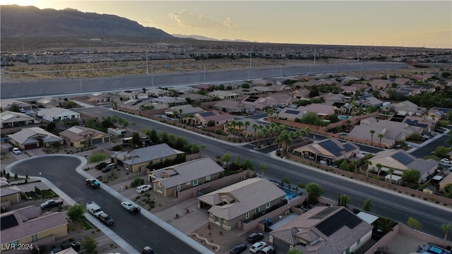 aerial view at dusk with a mountain view