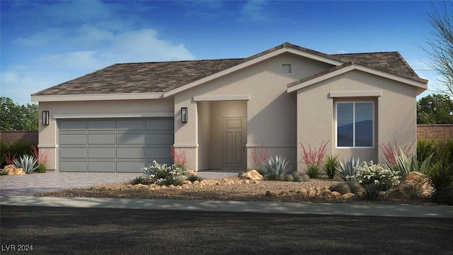 ranch-style home with a garage