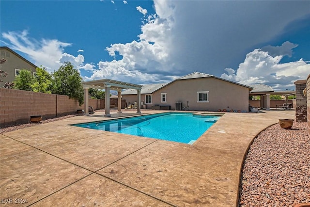 view of pool featuring a pergola and a patio