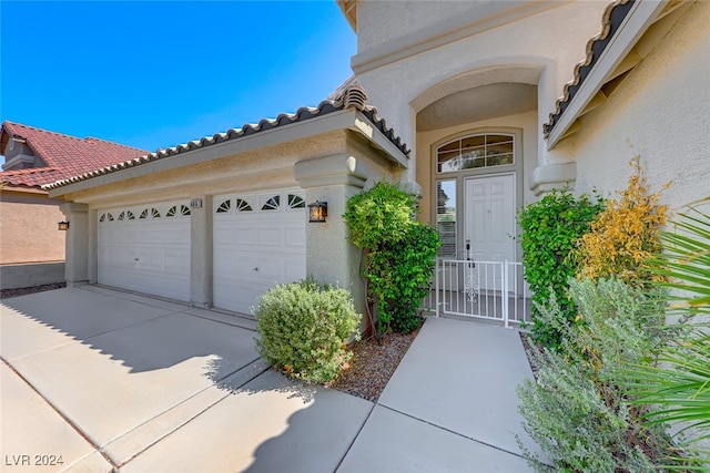 exterior space with a garage