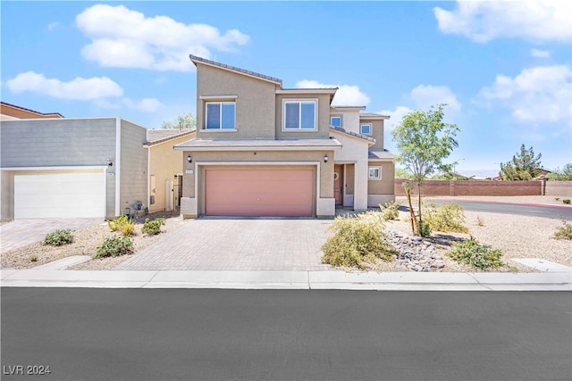 view of front of property featuring a garage