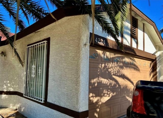 view of home's exterior with a garage