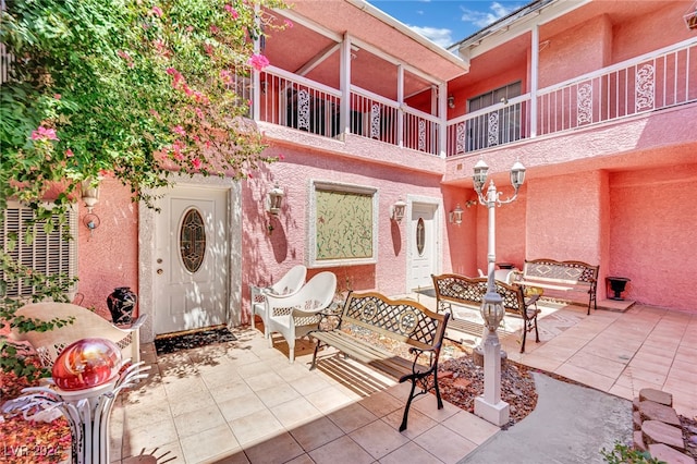 view of patio with a balcony