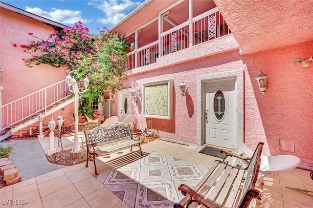 view of patio with a balcony