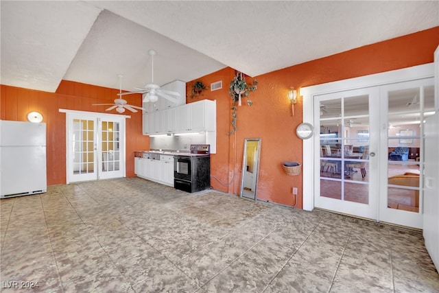 unfurnished living room with ceiling fan, light tile patterned flooring, and french doors