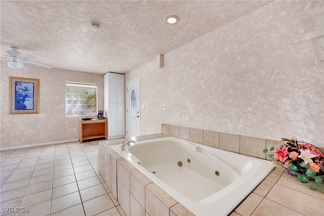 bathroom with a textured ceiling, tile patterned flooring, and ceiling fan