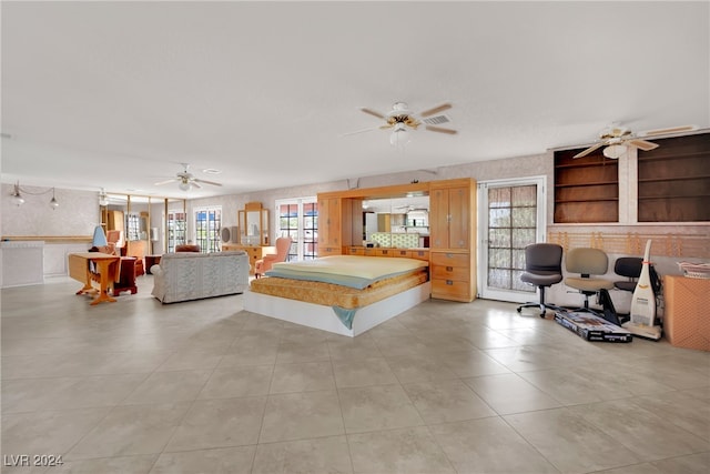 bedroom with light tile patterned floors