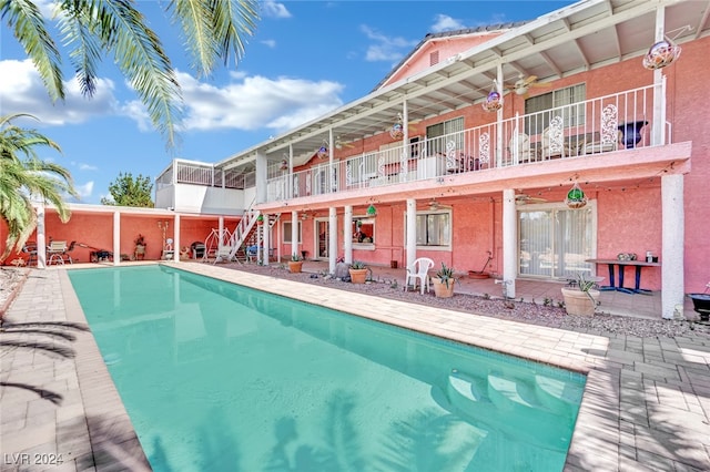 view of pool featuring a patio area