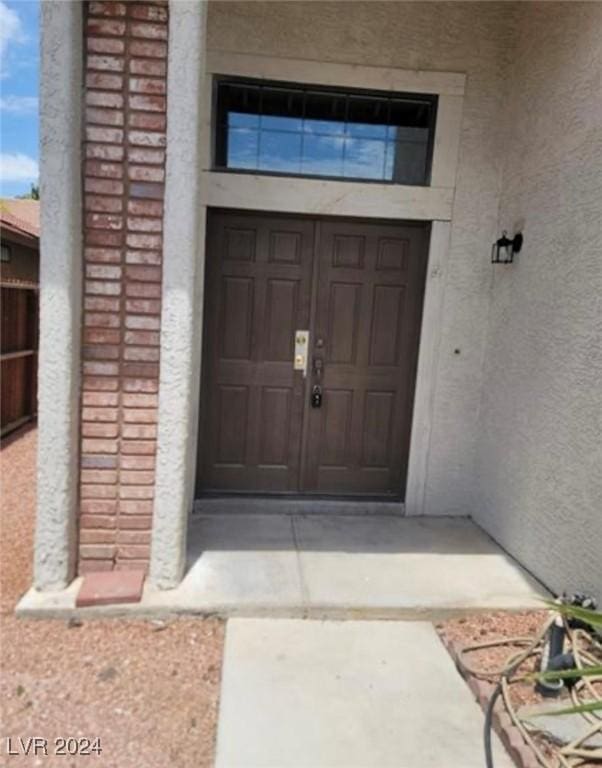 6444 Deadwood Rd, Las Vegas, NV 89108 - view of exterior entry with stucco siding