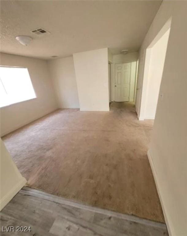 6444 Deadwood Rd, Las Vegas, NV 89108 - empty room featuring wood finished floors and visible vents
