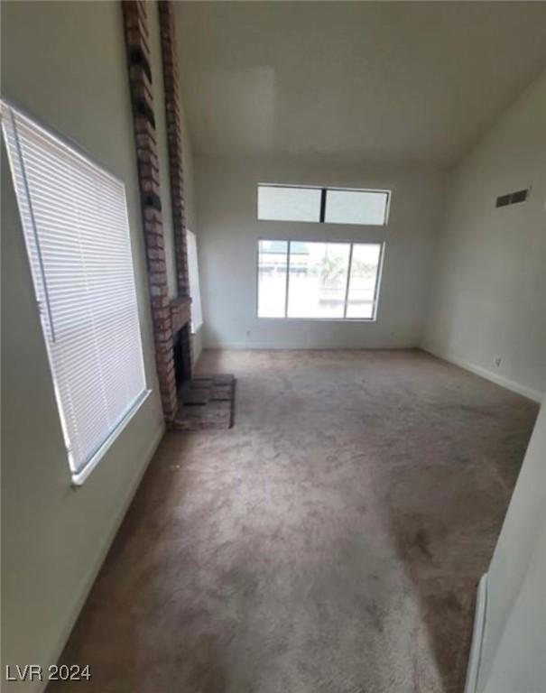 empty room with carpet flooring