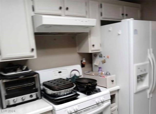 kitchen with range hood, white appliances, and white cabinetry