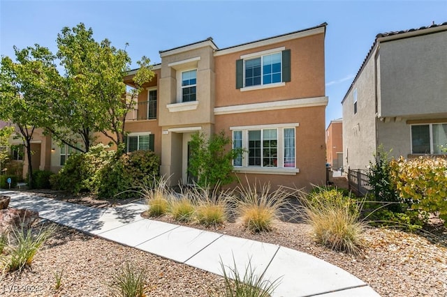 view of front of house featuring stucco siding