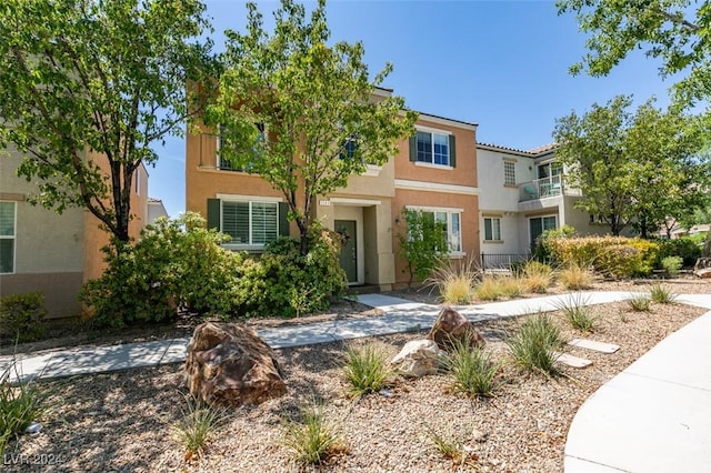 view of front of house featuring stucco siding