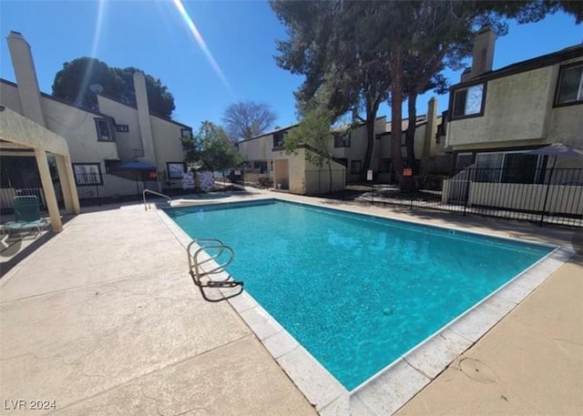 view of pool with a patio area