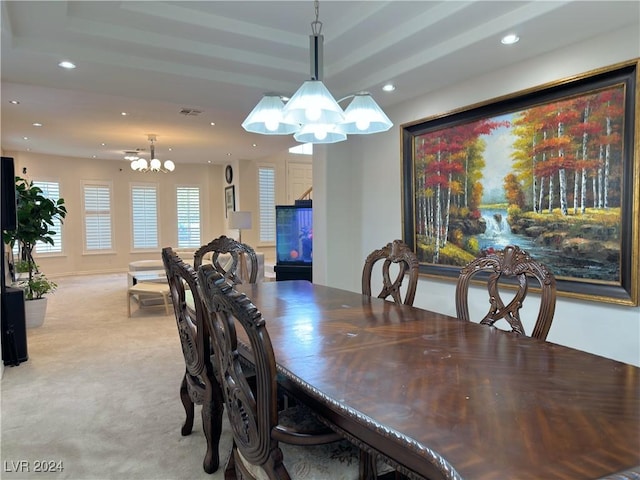 dining room featuring recessed lighting, light carpet, visible vents, and an inviting chandelier