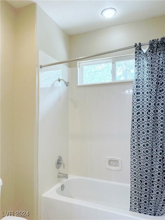 bathroom featuring bathing tub / shower combination