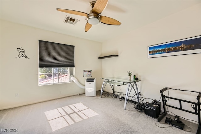 interior space featuring carpet flooring and ceiling fan