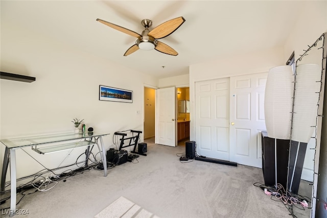 miscellaneous room featuring ceiling fan and carpet