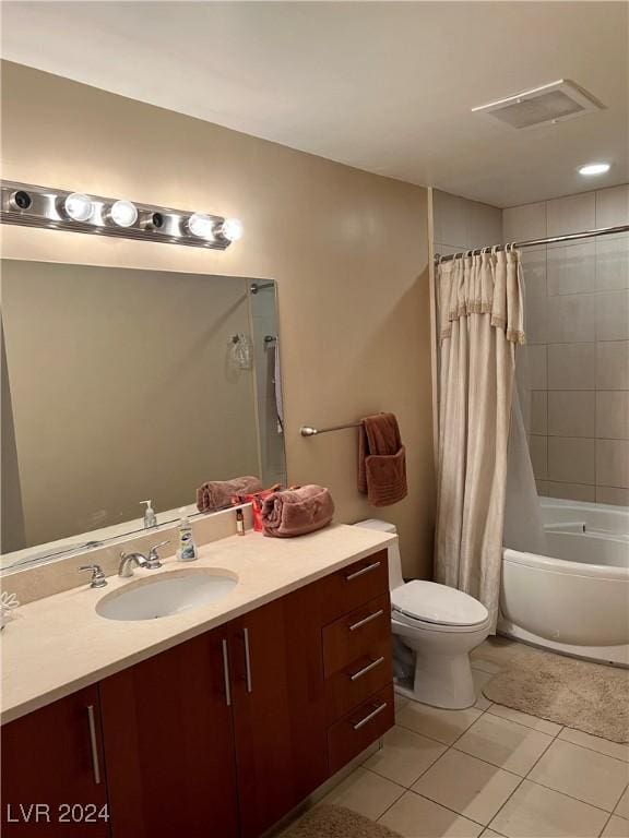 full bathroom featuring toilet, tile patterned flooring, vanity, and visible vents