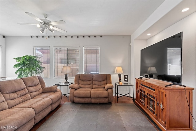 tiled living room featuring ceiling fan