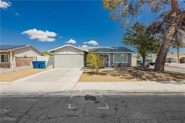 single story home featuring a garage