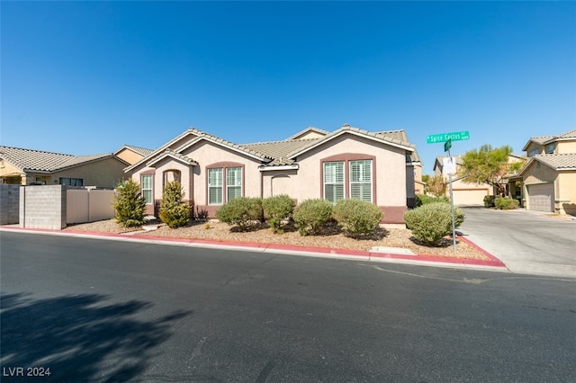 view of front of home with a garage