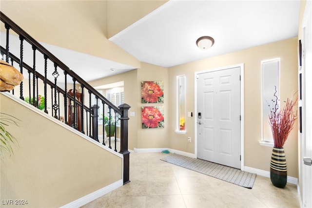 entrance foyer featuring light tile patterned floors