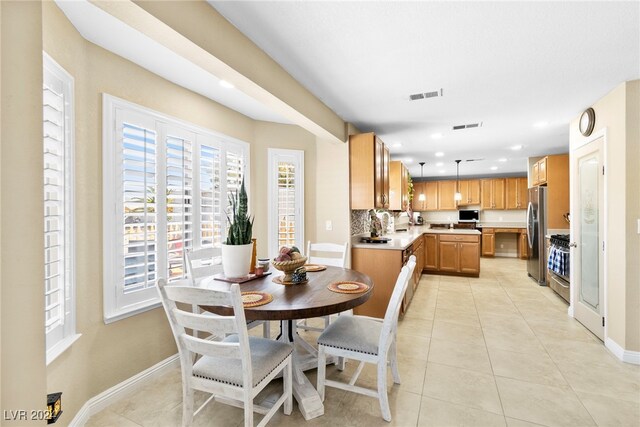 dining room with light tile patterned floors