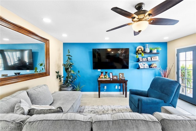 tiled living room with ceiling fan