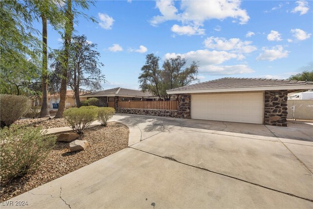 single story home featuring a garage