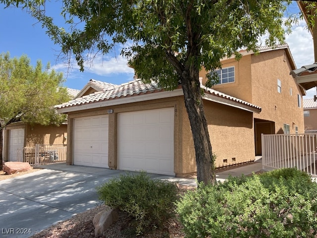 view of front of home featuring a garage