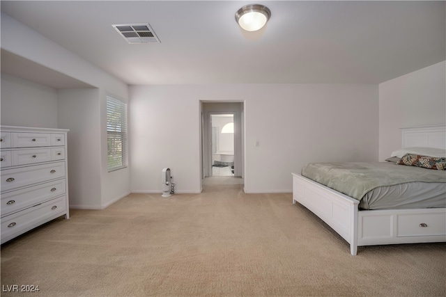 bedroom with light carpet