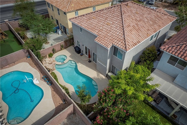 view of pool featuring a patio