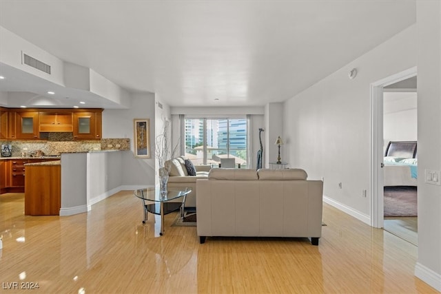 living room featuring light wood-type flooring