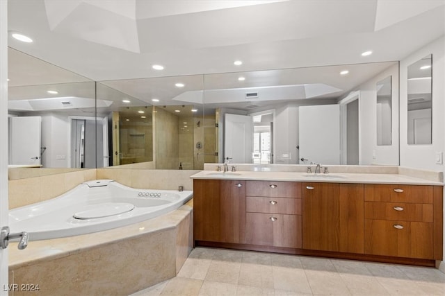 bathroom with vanity and plus walk in shower