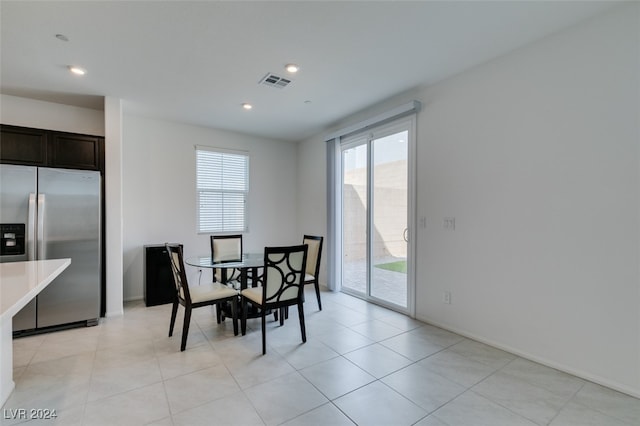 dining room featuring light tile patterned floors