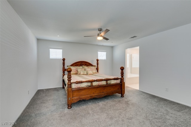 bedroom with multiple windows, light colored carpet, and ceiling fan