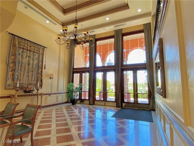 30 Strada Di Villaggio 204, Henderson, NV 89011 - community lobby with a decorative wall, a towering ceiling, recessed lighting, and ornamental molding