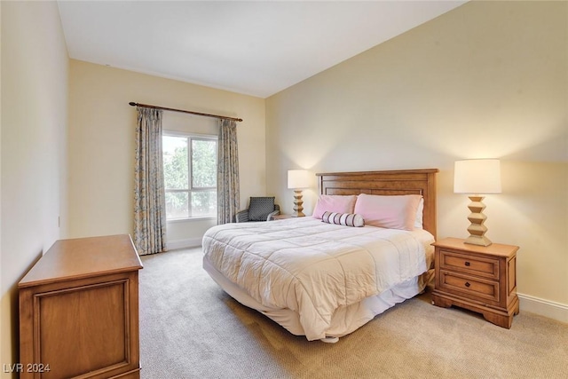 30 Strada Di Villaggio 204, Henderson, NV 89011 - bedroom with light carpet and baseboards