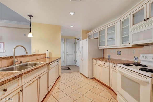 30 Strada Di Villaggio 204, Henderson, NV 89011 - kitchen with white appliances, decorative light fixtures, light tile patterned floors, backsplash, and recessed lighting