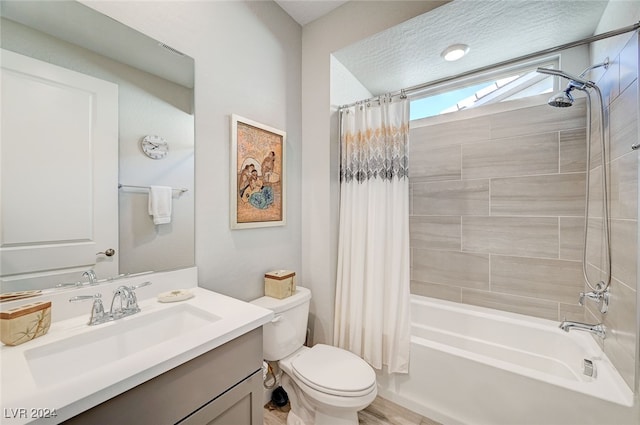 full bathroom featuring vanity, toilet, and shower / bath combo