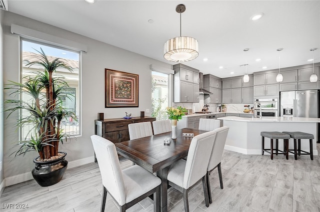 dining room featuring light hardwood / wood-style flooring