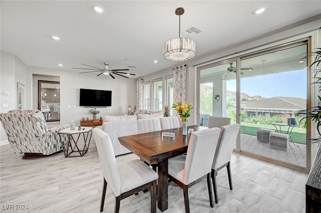 dining space with ceiling fan