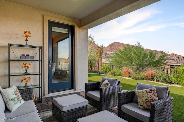 view of patio / terrace with a mountain view